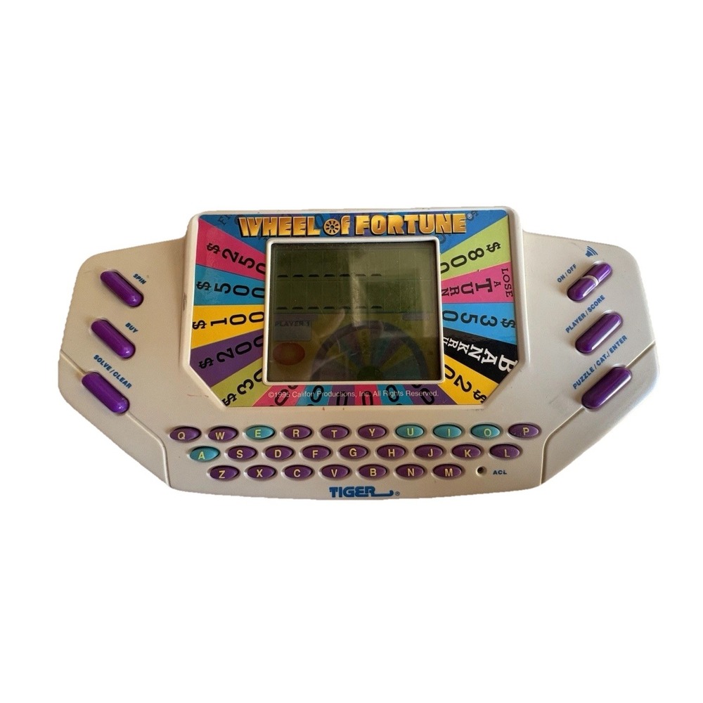 Tiger Electronics Wheel of Fortune Handheld Electronic Game 753104 Tested/Works